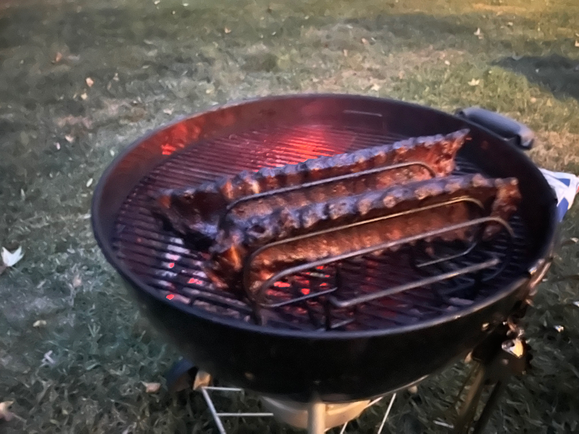 The ribs over live coals as the light goes